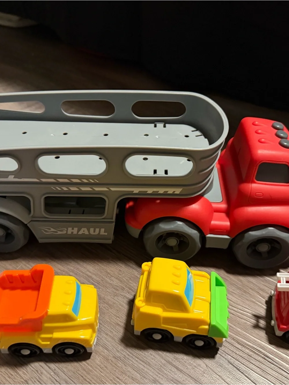 Kids Red and Gray Haul Truck Playset with 6 Mini Vehicles (cop, firetruck, etc)